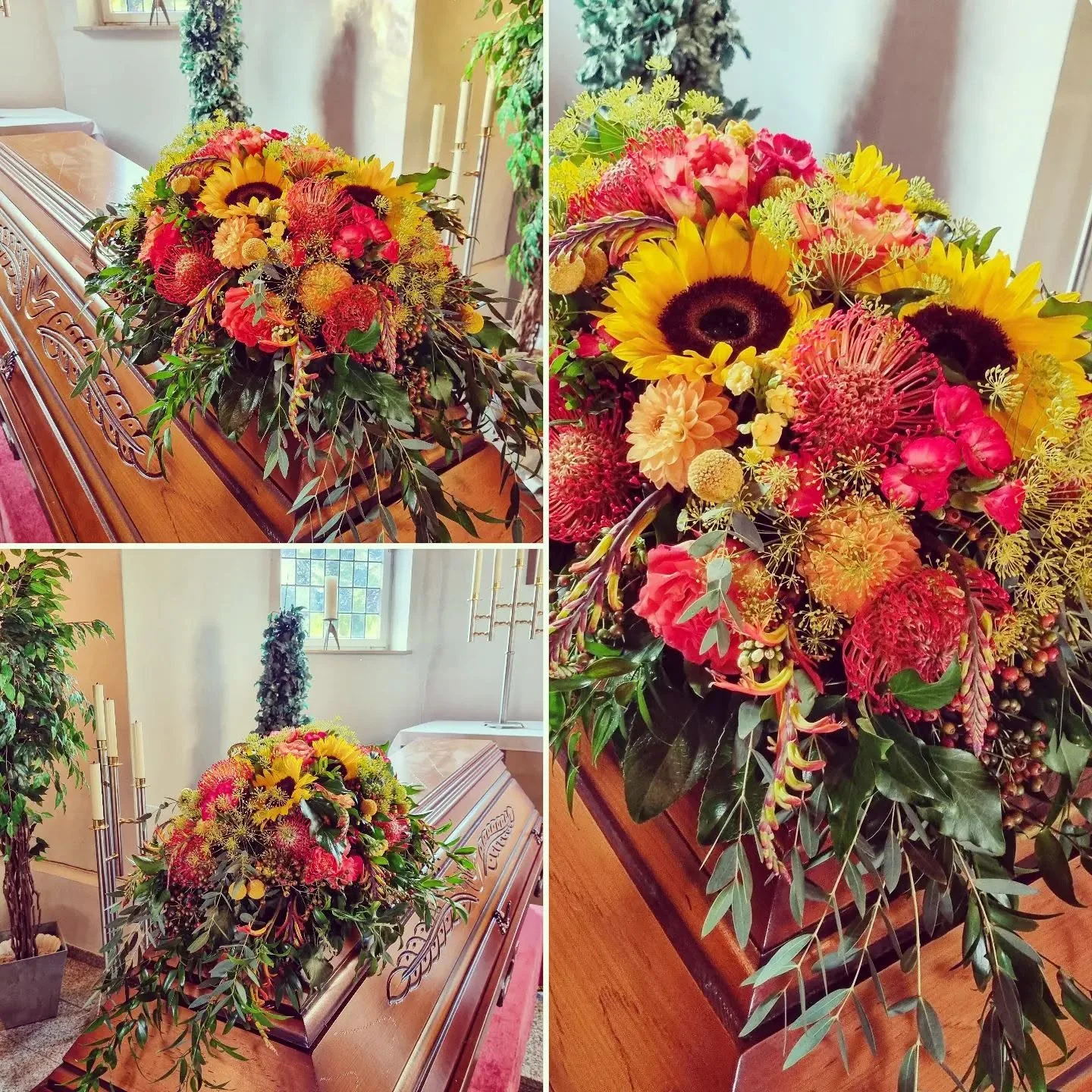 Farbenfroher Sargschmuck mit Sonnenblumen und Blüten in Rot, Orange und Gelb