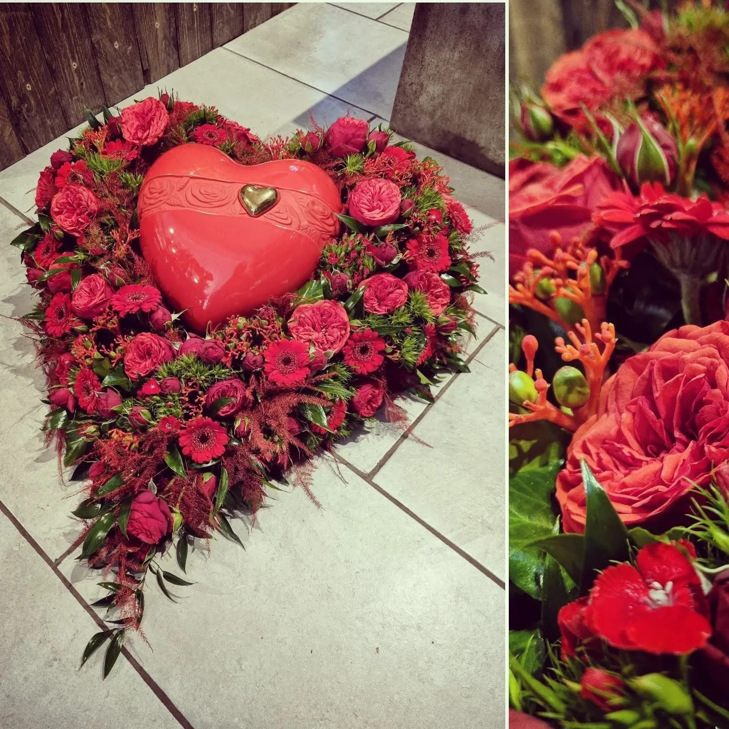 Herzförmiger Urnenschmuck in kräftigem Rot mit Rosen und Gerbera
